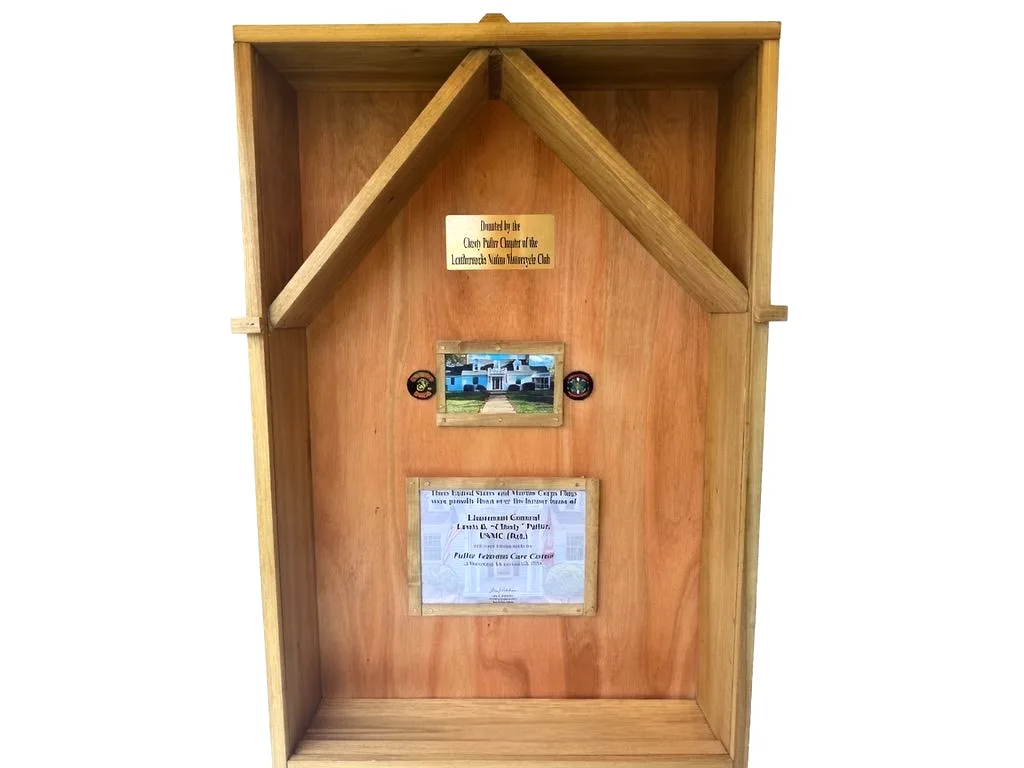 Handmade wooden keepsake display with framed memorabilia, view 1